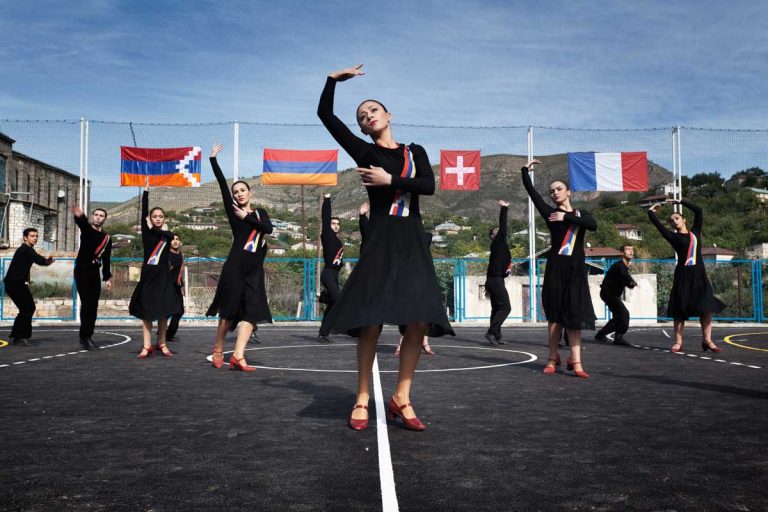 Khnabad. Dancers from the National Dance School performing during the inauguration of the sports' court, financed by Armenians living in France and Switzerland. Nagorno-Karabakh relies assistance from abroad, Armenian Diaspora in Russia, US and France are building basic infrastructures such as schools, roads and hospitals.