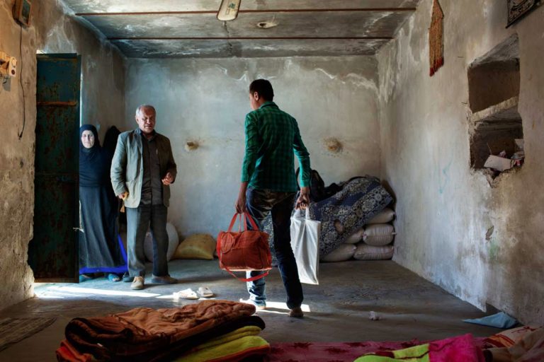 Ghaffar is about to leave his home for the hospital where he will be transplanted the kidney. Iran, November 2014.